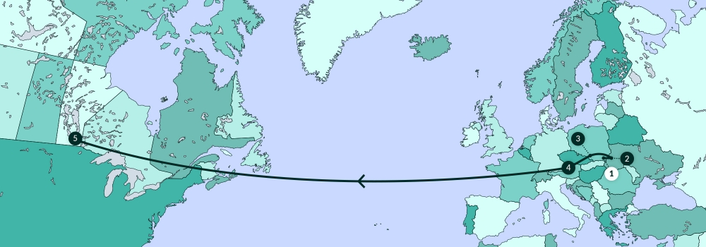 Une carte grise illustrant la plupart de l'Amérique du Nord, l’Europe, et partie de l’Afrique. Une ligne traverse divers endroits de la carte.