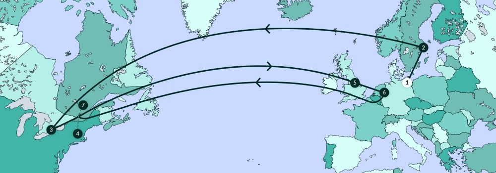 Une carte grise illustrant la plupart de l'Amérique du Nord, de l’Europe, et une partie de l’Afrique. Une ligne traverse divers endroits de la carte.