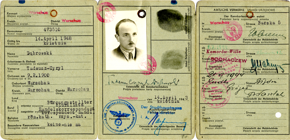 Copy of an unfolded identity document, split in three pages. The pages include red and blue stamps, typed and handwriting information, as well as two black fingerprints. The middle page has a black-and-white identity photograph of a man with a moustache, wearing a suit.