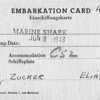 Copie d'une carte d'embarquement. Le document est typographié et il y a une étampe indiquant “MARINE SHARK JUN 8 1948”, il y a aussi de l'écriture manuscrite.